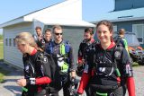 Skydivers walking to board the aircraft at Parachute Ottawa skydiving centre