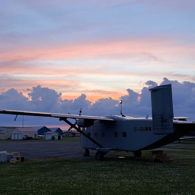 Shorts Skyvan aircraft at sunset on the tarmac at Parachute Ottawa in Canada